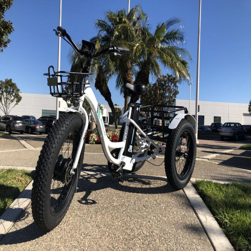 Emojo 500W Caddy Step Through Electric Tricycle - white tricycle parked outside